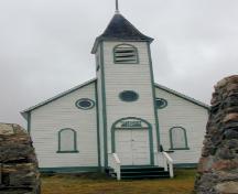 Front view of St. Laszlo Canadian Magyar Hall as seen through two of the memorial cairns, 2003.; Government of Saskatchewan, Jay Kasperski, 2004.
