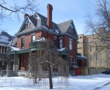 Of note is the slate roof, multiple gables, palladian windows and decorative brickwork.; Paul Dubniak, 2008.