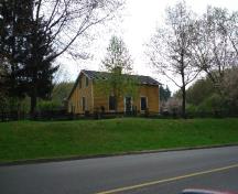 Featured is the Bradley House hip roof extension on the south elevation.; Paul Dubniak, 2008.