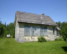 Primary elevations, from the east, of Riverland School, Lac du Bonnet area, 2009; Historic Resources Branch, Manitoba Culture, Heritage and Tourism, 2009
