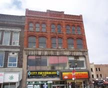 Of note are the arched windows of the fourth and third storey.; Chelsey Tyers, 2008.