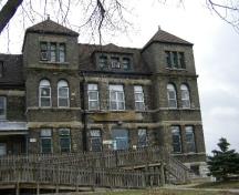 Of note are the two Tuscan campaniles with both flat and arched windows.; Emily Elliot, 2007.
