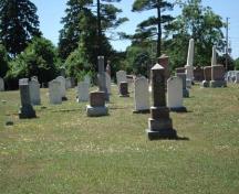 Of note is the mixture of historic and modern headstones.; Kendra Green, 2007.