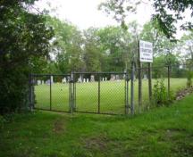 Of note is the setting with mature trees surrounding the cemetery.; Kirsten Pries, 2008.