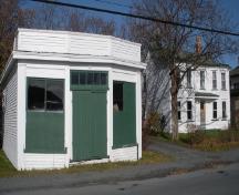 View of the Calpin/Myers Property, Bay Roberts, NL, showing the shop on the left and the house on the right. Photo taken 2009. ; HFNL/Andrea O'Brien 2010