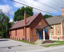 Of note is the brick exterior and metal gable roof.; Kirsten Pries, 2008.