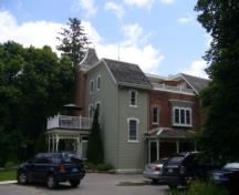 Of note is the building's lack of symmetry as seen in the windows and additions.; Kirsten Pries, 2008.