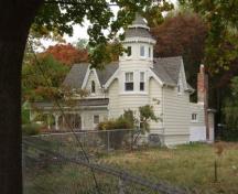 Featured is the two-and-a-half storey octagonal tower with a pagoda-like, two-tiered roof.; Paul Dubniak, 2009.