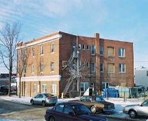 This image shows details of the south facade and the rear facade facing east. Note the massing of the building, which reflects the odd-shaped lot.; City of Edmonton, 2004