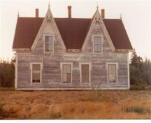 The Isaac Newton House in a state of disrepair before extensive restoration.; Dale Brown