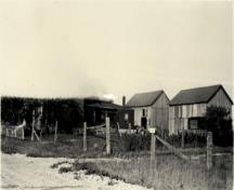 General view of Glengarry Landing National Historic Site of Canada, showing the division of the site into several lots with different structures and access roads.; Parks Canada Agency/Agence Parcs Canada