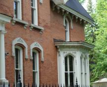 Detail of side facade bay window and eaves.; RHI2 2009
