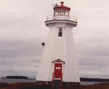 View of the façade of the Light Tower, showing the building’s tall form and massing, 1989.; Transport Canada / Transports Canada, 1989.