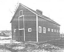 General view of the Dairy Barn, showing the front and side façades, 1992.; Department of Public Works, AES, PC, WRO / Ministère des Travaux publics, SAG, PC, BRO, 1992.