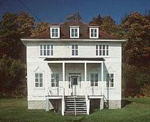 General view of Building 49, showing the regularly spaced windows of the façade, circa 2004.; Parks Canada Agency / Agence Parcs Canada, circa/vers 2004.