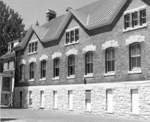 General view of one of the Old Gymnasium façades, 1988.; Department of National Defence / Ministère de la Défense nationale, KNC, 1988.
