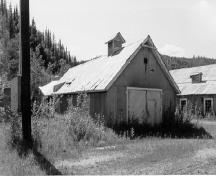 View of the Carpentry Shop, showing the simple and functional nature of its design, 1988.; Agence Parcs Canada / Parks Canada Agency, 1988.