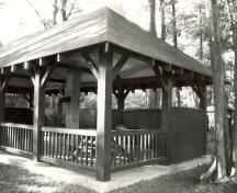 General view of the shelter, showing the open design and unpartitioned interior space, 1992.; Archaeological Services and Historica Ltd., 1992.
