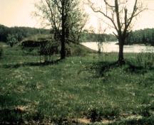 General view of the Kay-Nah-Chi-Wah-Nung National Historic Site of Canada, showing the ancient burial mounds in their undisturbed condition.; Agence Parcs Canada / Parks Canada Agency n.d.