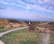 General view showing the location on an isolated, extreme easterly point of land overlooking the Atlantic Ocean.; Parks Canada Agency / Agence Parcs Canada
