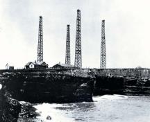 View of the exterior of the Marconi site, showing the towers.; Parks Canada Agency / Agence Parcs Canada.