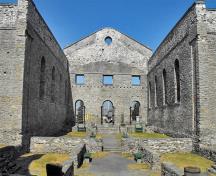 General view of the interior of the Ruin of St. Raphael's Roman Catholic Church showing the simple Palladian design with wide triangular pediment, a three-bay composition and round-headed window openings on all elevations, 2009.; Flickr, guidedbycthulhu, 2009.