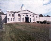 General view of the North Lodge building showing the temple form with side additions of the principle elevation.; Parks Canada Agency / Agence Parcs Canada, n.d.