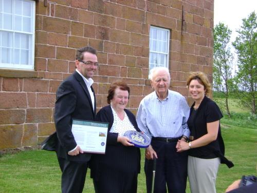 Presentation of designation plaque