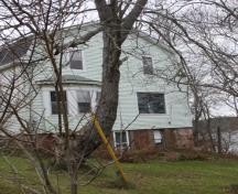 Side view of the George W. Crawford House showing the exposed portion of the foundation.; Grand Bay-Westfield