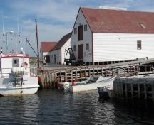 View of Salmon Store, Battle Harbour, NL shown in foreground. ; © HFNL 2013 