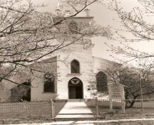 Front façade showing pointed-arch windows and stained glass transom, n.d.; St. Paul's Anglican Church