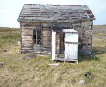 South elevation of tractor shed; Parks Canada Agency / Agence Parcs Canada, 2004.