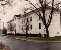 North elevation of Building B-1, showing the main entrance, 1993.; Department of National Defence / Ministère de la Défense nationale, 1993.