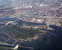 Aerial view of the Whitefish Island National Historic Site of Canada featuring its cover of dense bruch, 2001.; Agence Parcs Canada / Parks Canada Agency, G. Vandervlugt, 2001.