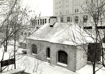 View of the exterior of the Lock Office, showing its asymmetrical one-and-a-half storey form, 1992.; Parks Canada Agency / Agence Parcs Canada, Armstrong-Reynolds, 1992.