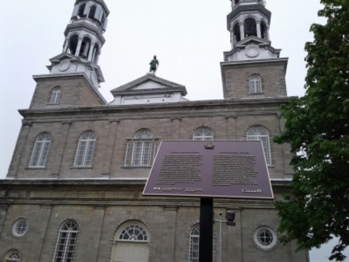 Plaque and church