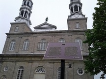 Photo of the façade and the HSMBC plaque; Parcs Canada | Parks Canada