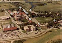 View of the Drill Hall, building 17, showing its large rectangular form and massing, circa 1971.; Gendarmerie royale du Canada | Royal Canadian Mounted Police, vers | circa 1971.